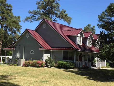 houses with red metal roof|colonial red roof.